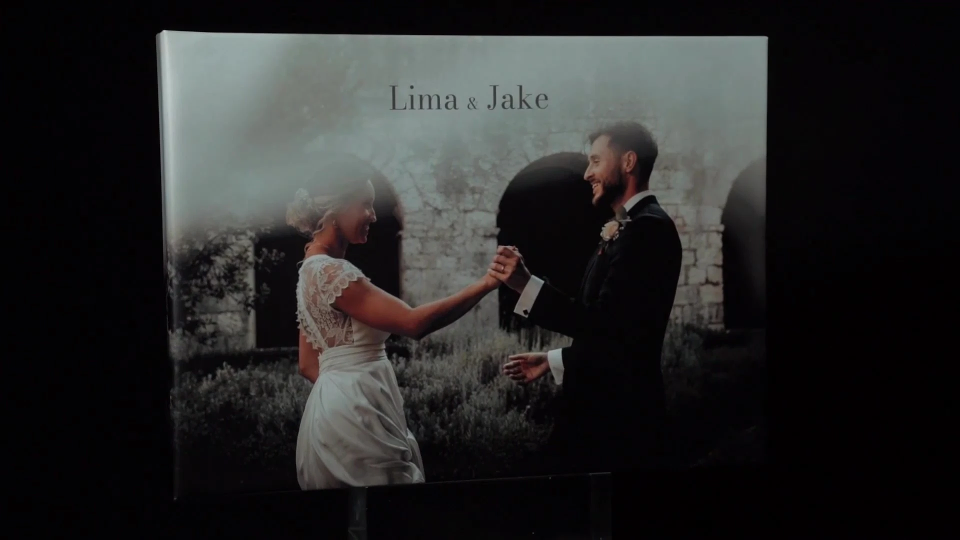 Wedding photograph printed across an album cover